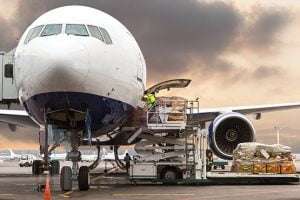 Airplane unloading freight cargo