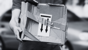 An image of a box that was badly damaged during transit. The damaged box shows why it is important to understand what freight insurance covers and why you need it for your business.